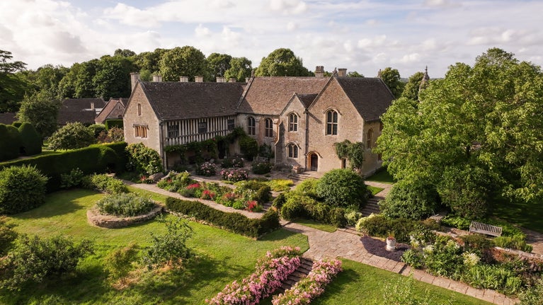 An aerial view of Great Chalfield Manor and Garden in early summer, Wiltshire